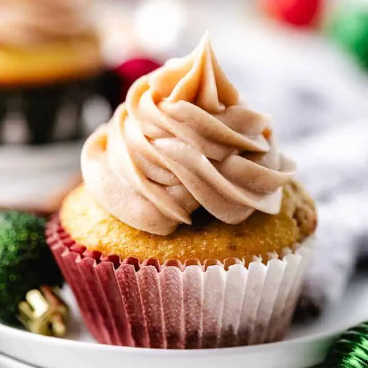 Close up view of a cupcake on a plate.