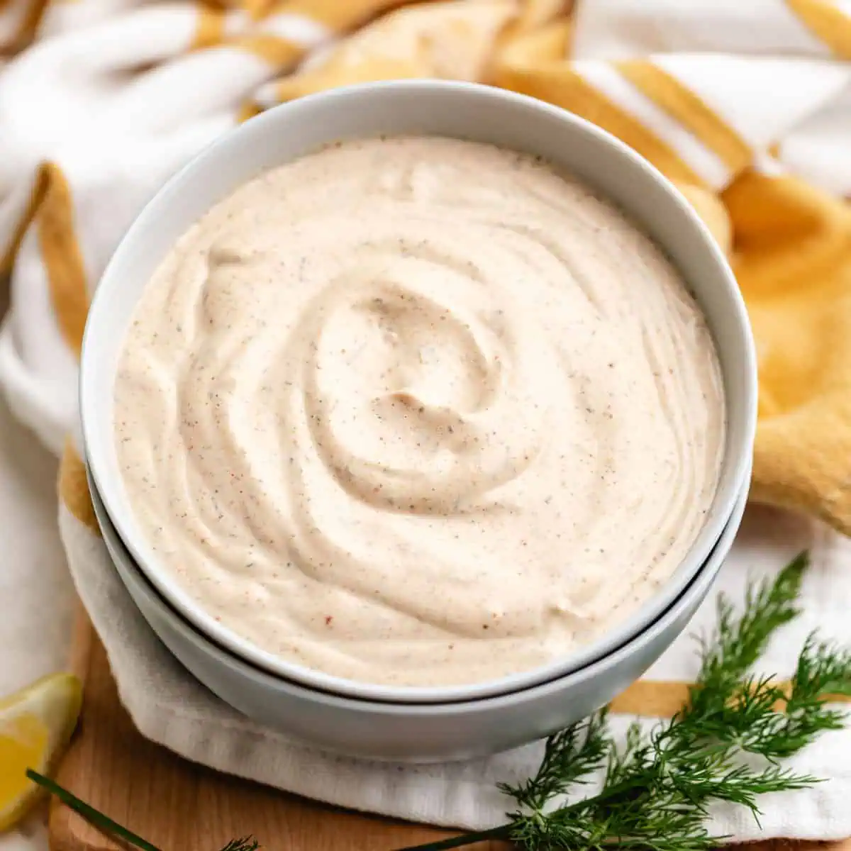 Close up view of a bowl of seasoned sauce.