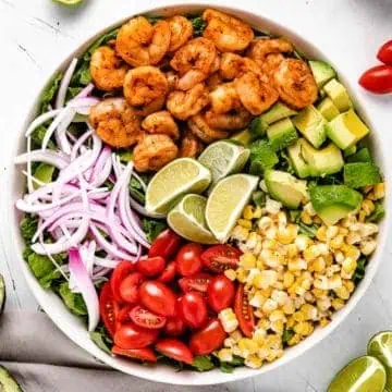 Top down view of a grilled shrimp bowl.