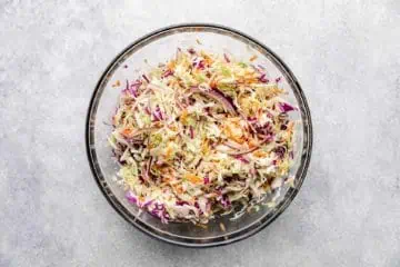 Coleslaw mixed in a bowl.