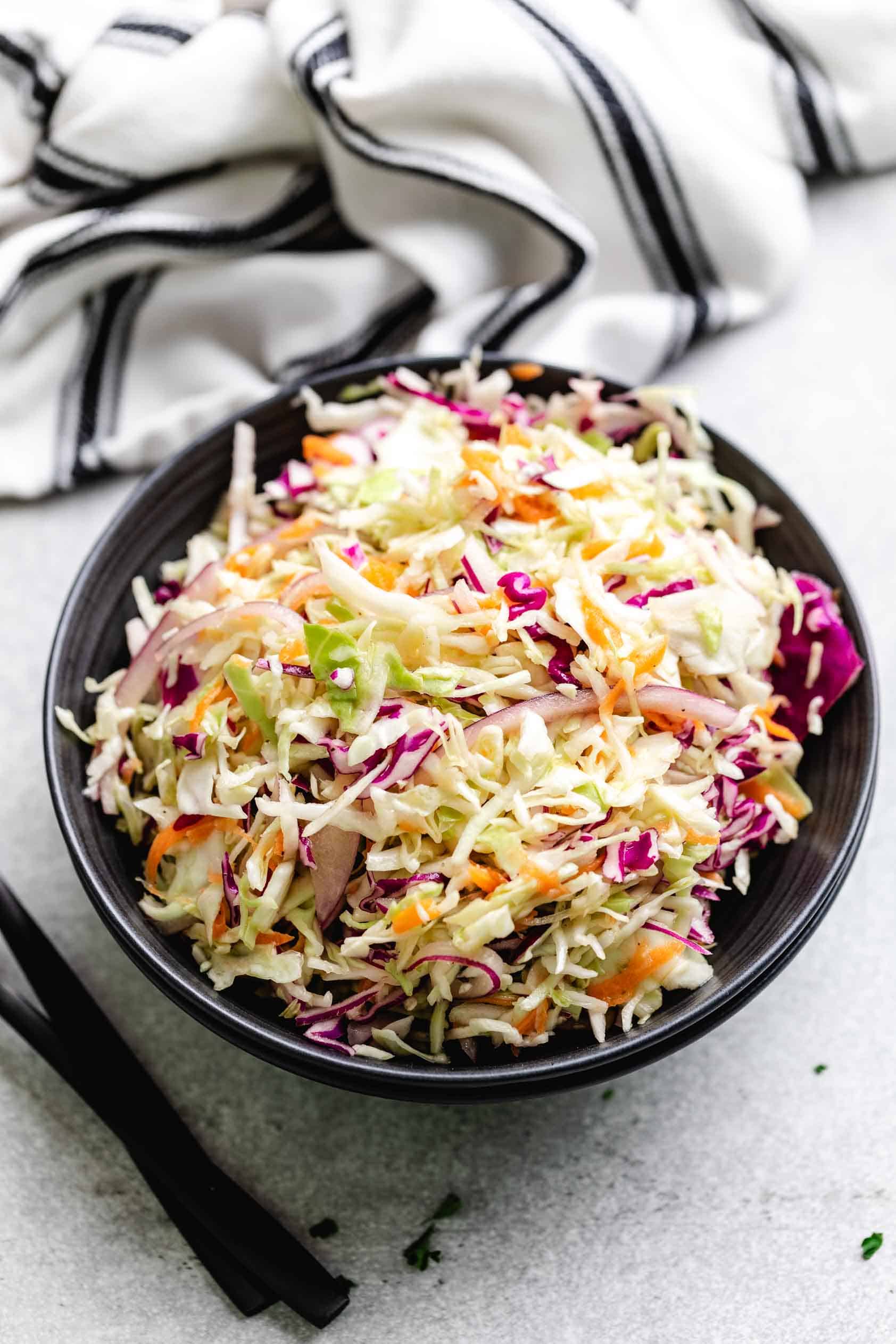 Colorful coleslaw in a bowl.
