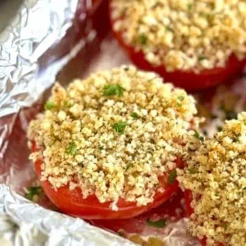 Cheesy crumb tomatoes in a pan.