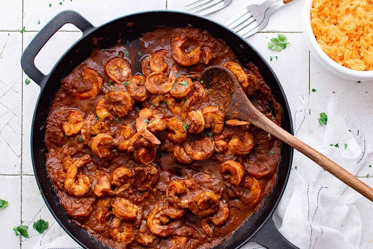 Black pan filled with shrimp diablo.