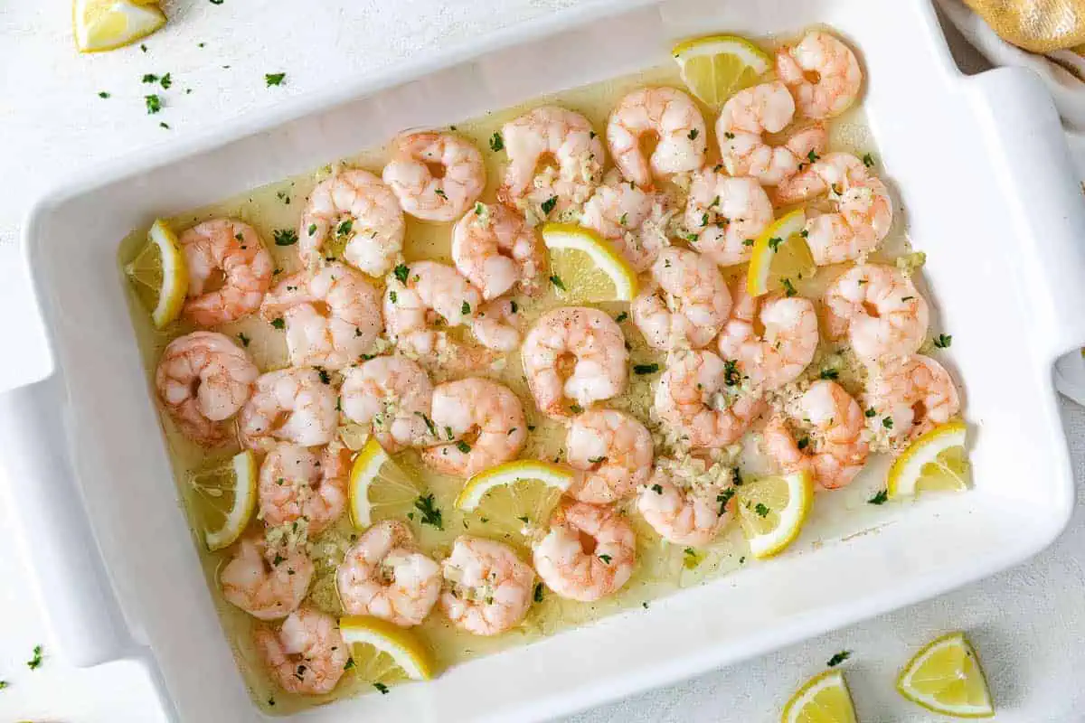 Pan of lemon butter baked shrimp.