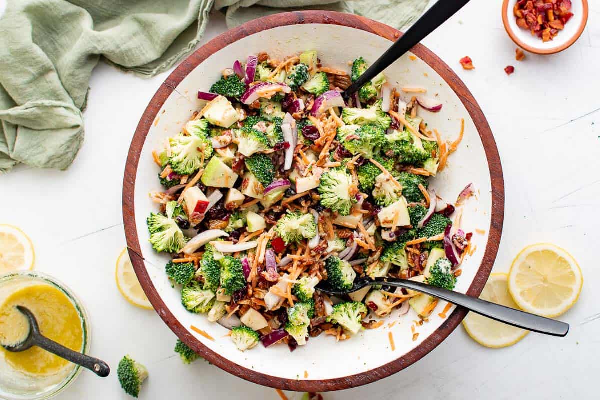 Tangy and sweet broccoli bacon salad in a large serving dish.