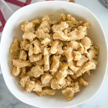 Crumb topping in a small white bowl.