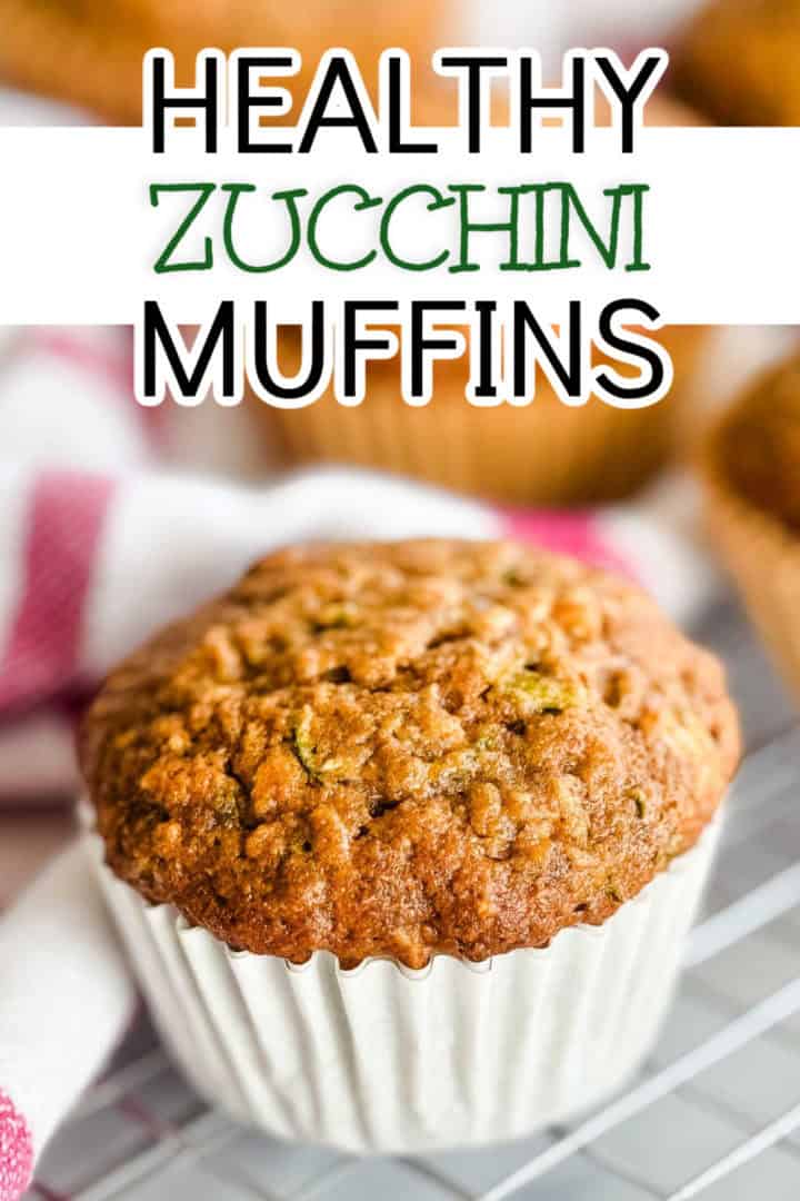 Healthy zucchini muffin in a white paper liner.