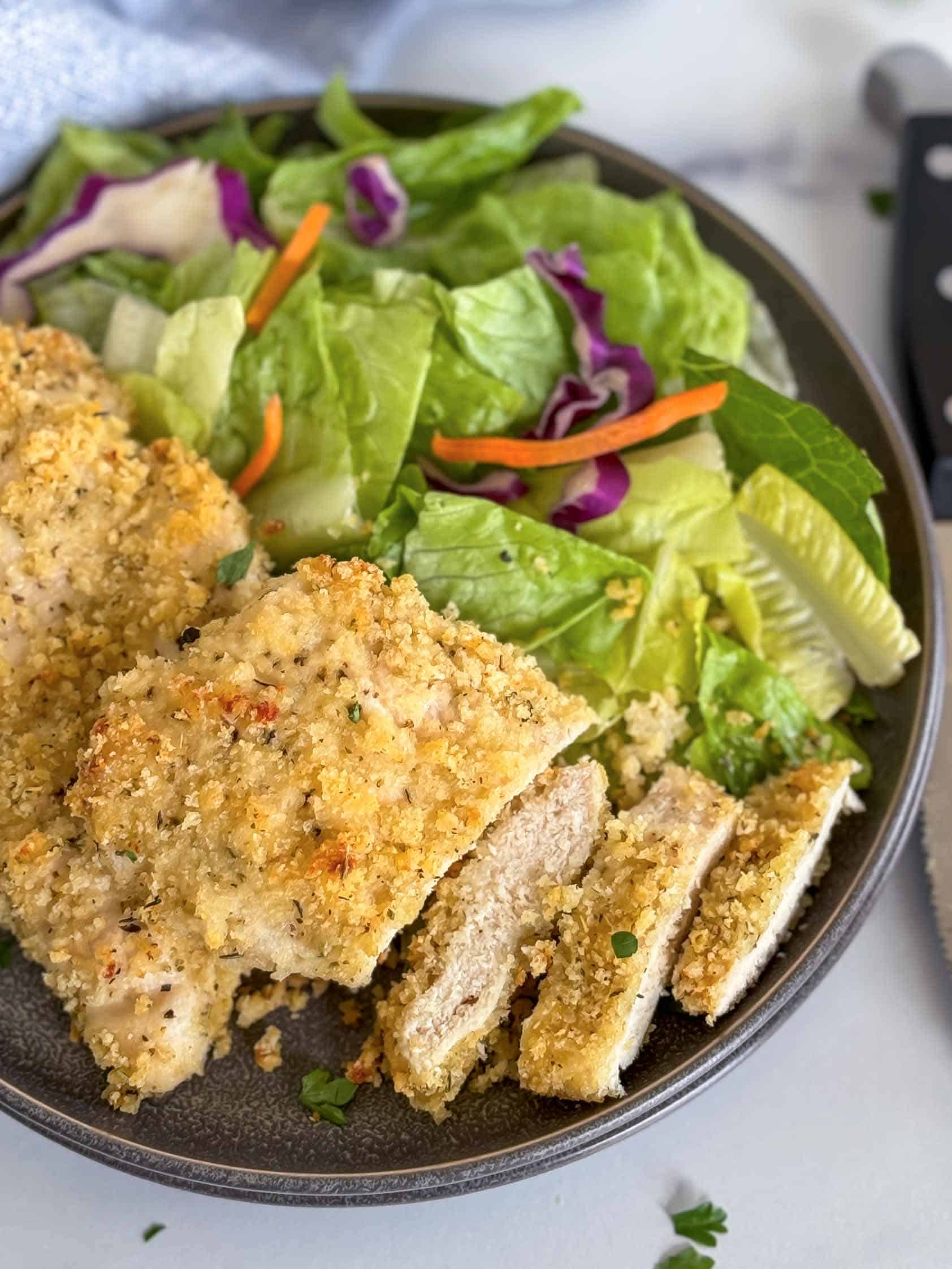 Panko breaded chicken with side salad.