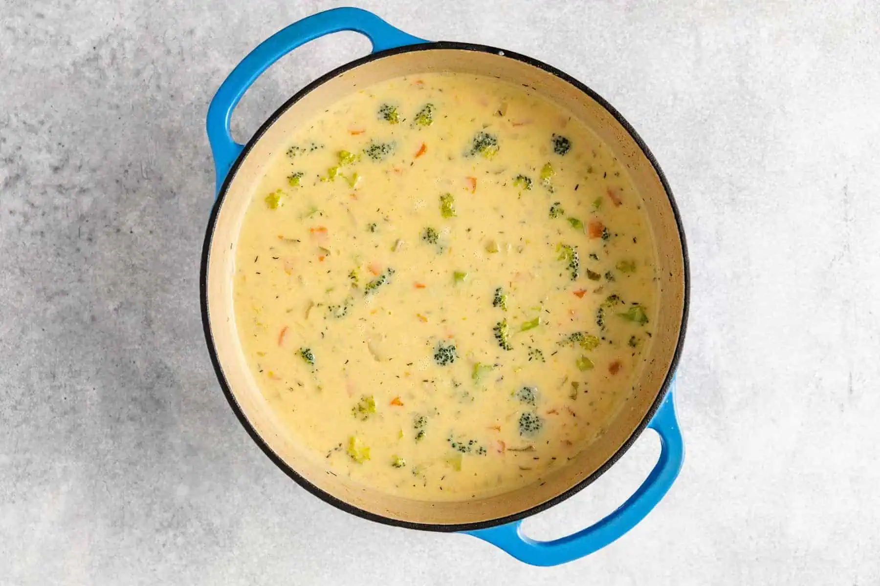 Potato and broccoli soup in a dutch oven.