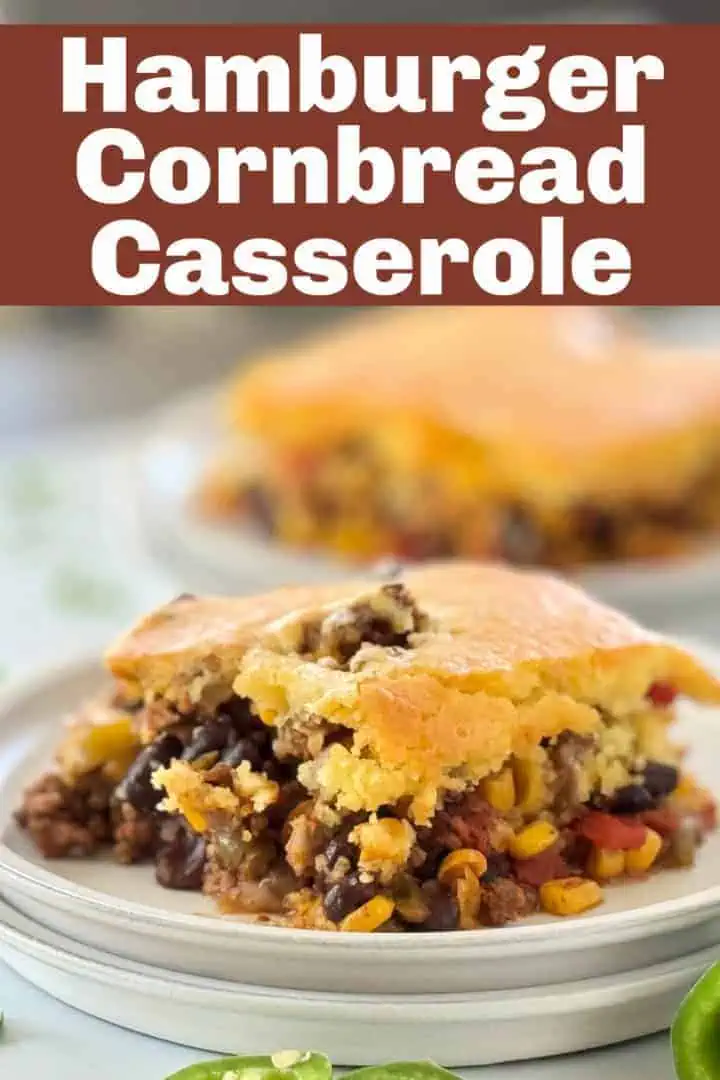 A pinterest pin image of hamburger cornbread casserole with text overlay "hamburger cornbread casserole" and a close-up of a slice of the casserole.