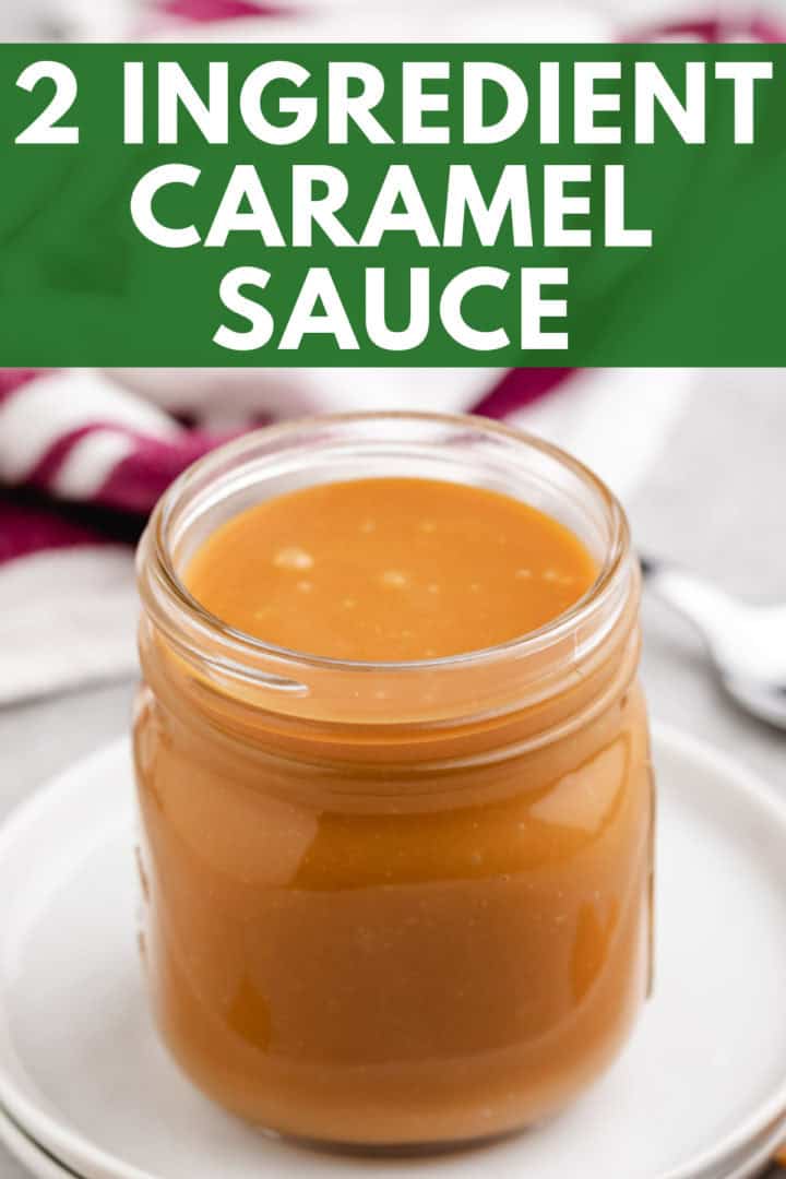 A jar of easy caramel sauce with a spoon.