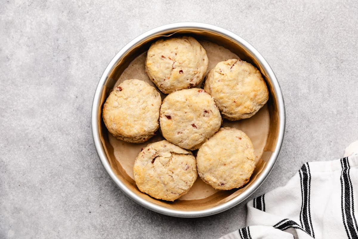 Baked maple bacon biscuits in a pan.