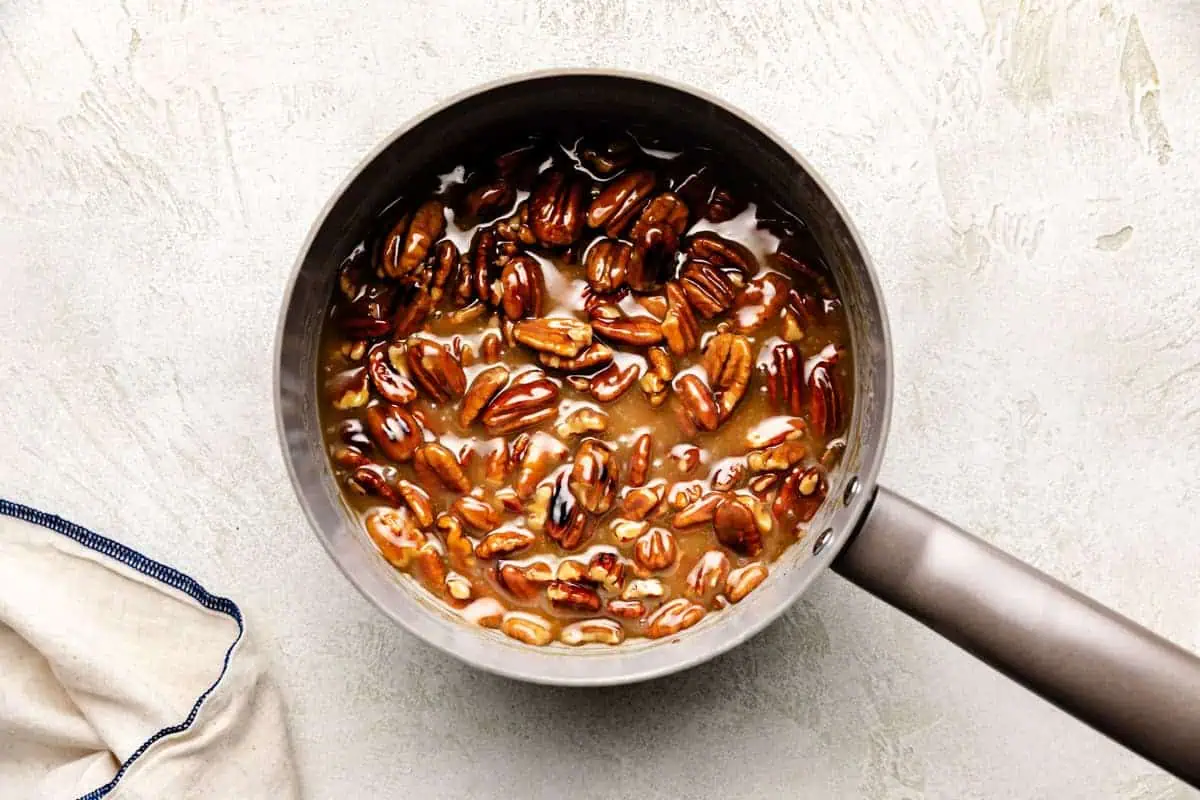 Pecan topping in a small pan.