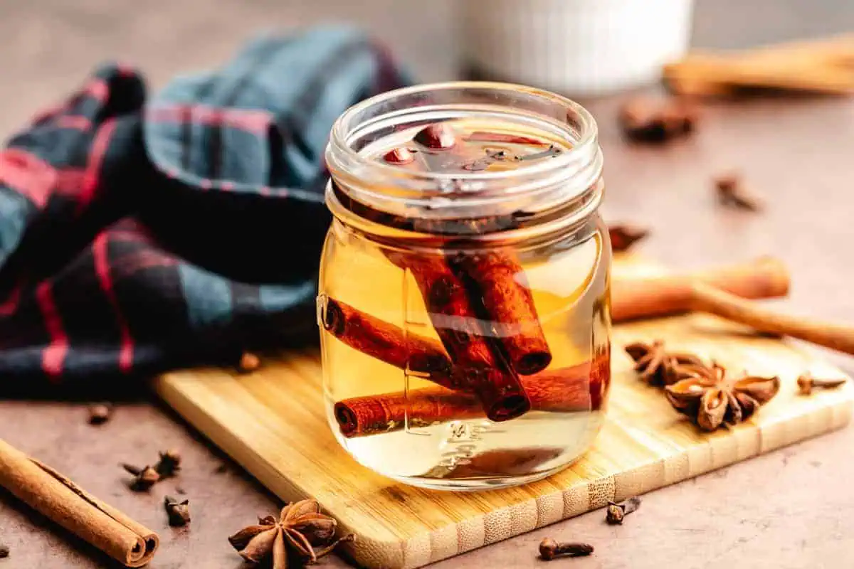 Side view of a jar of holiday simple syrup.