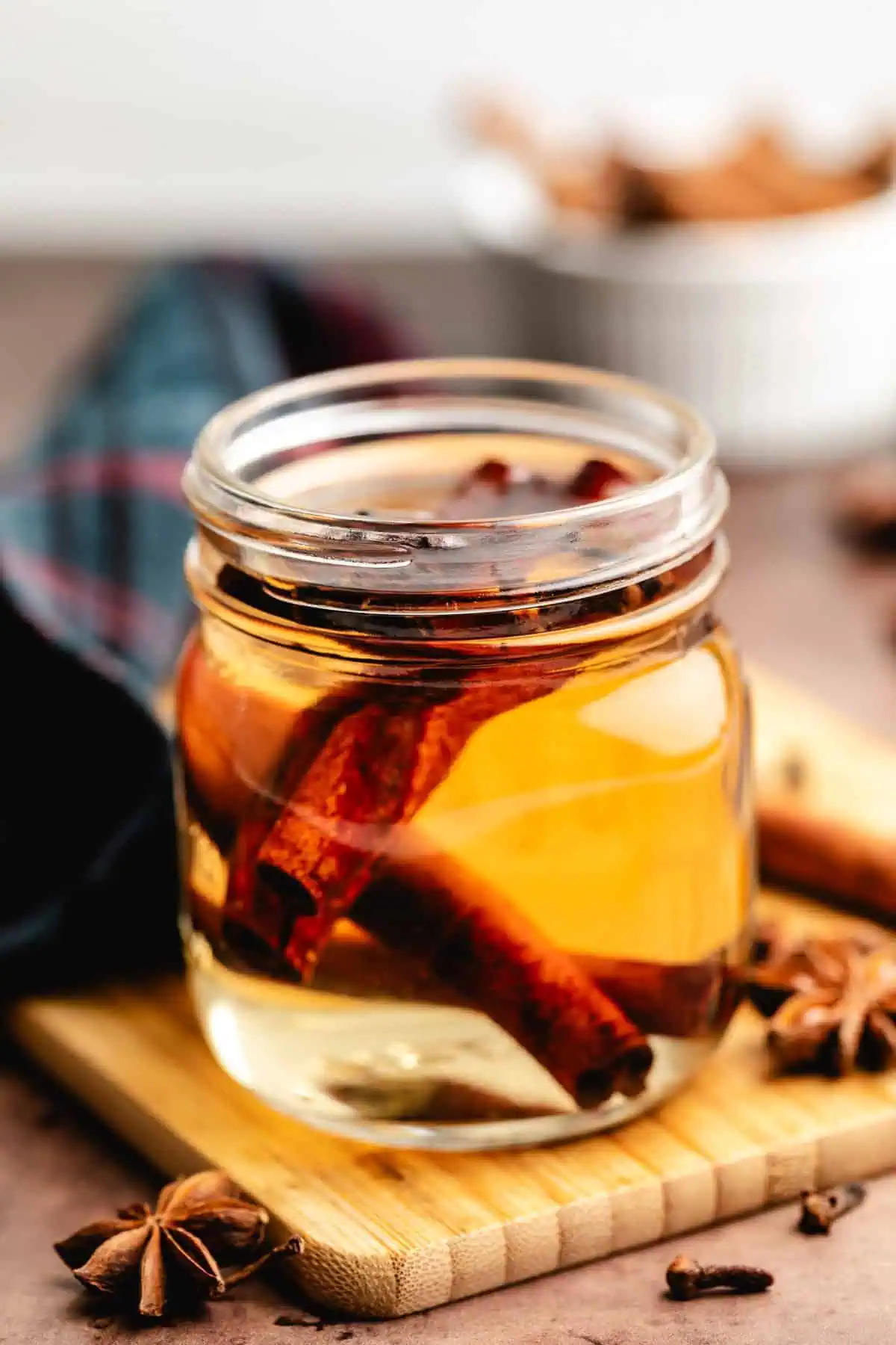 Close up view of simple syrup in a jar.