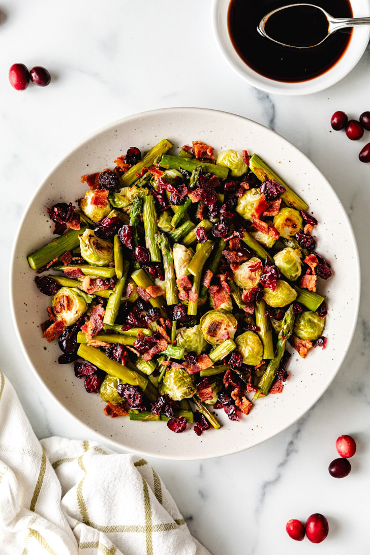 Overhead view of asparagus and brussels sprouts thanksgiving side dish.