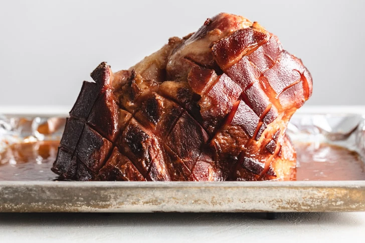 Baked ham on a sheet pan.