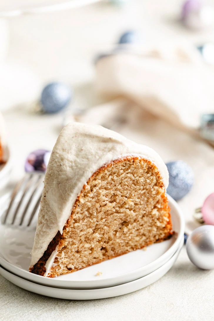 Fork on a plate with a slice of bundt cake.