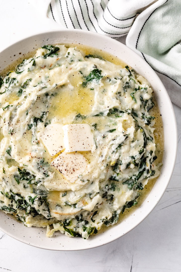 Colcannon mashed potatoes with melted butter.