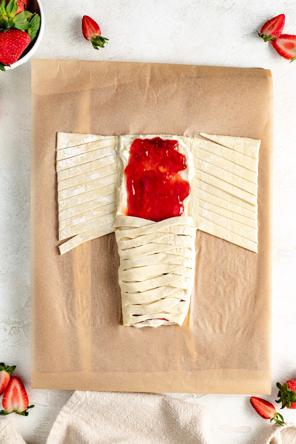 Strawberry puff pastry recipe half braided.