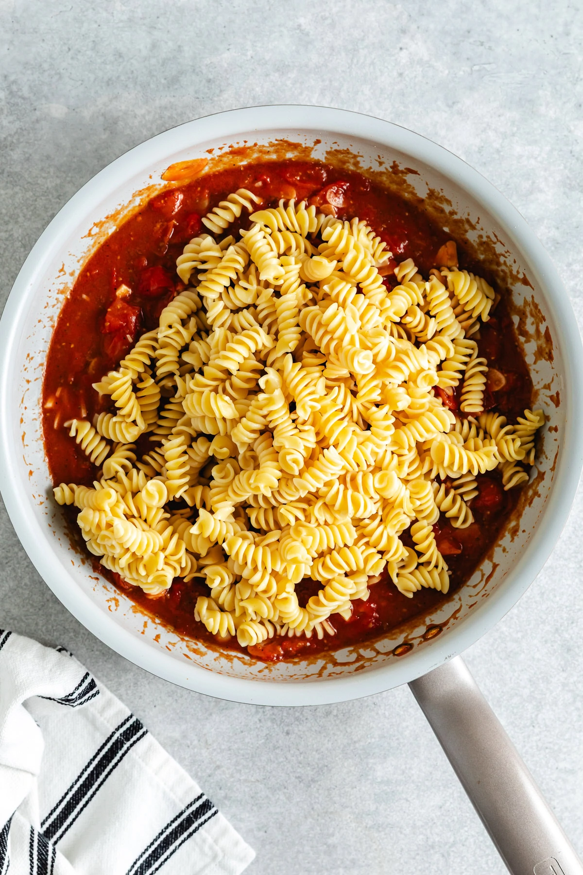 Fusilli noodles over a pan sauce.
