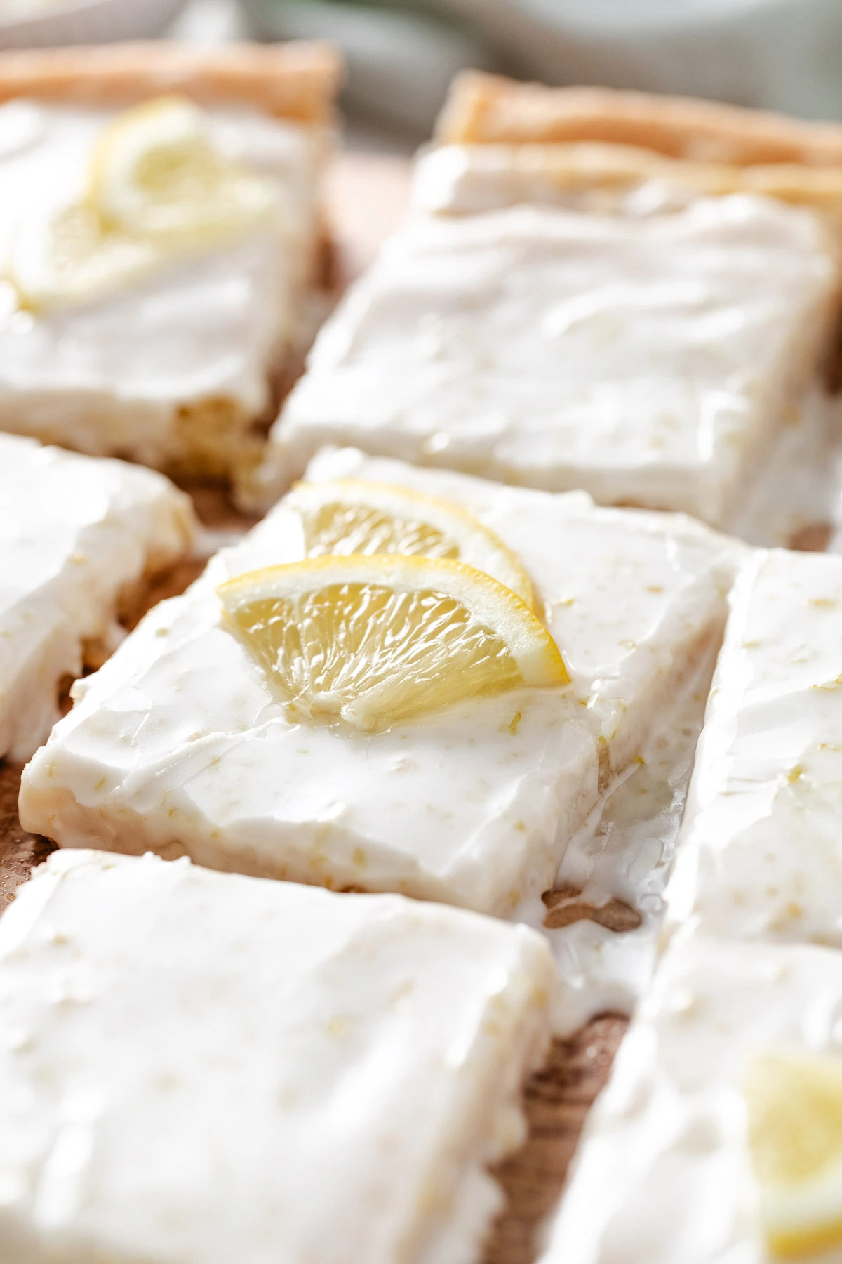 Lemon sugar cookie bars with lemon icing.