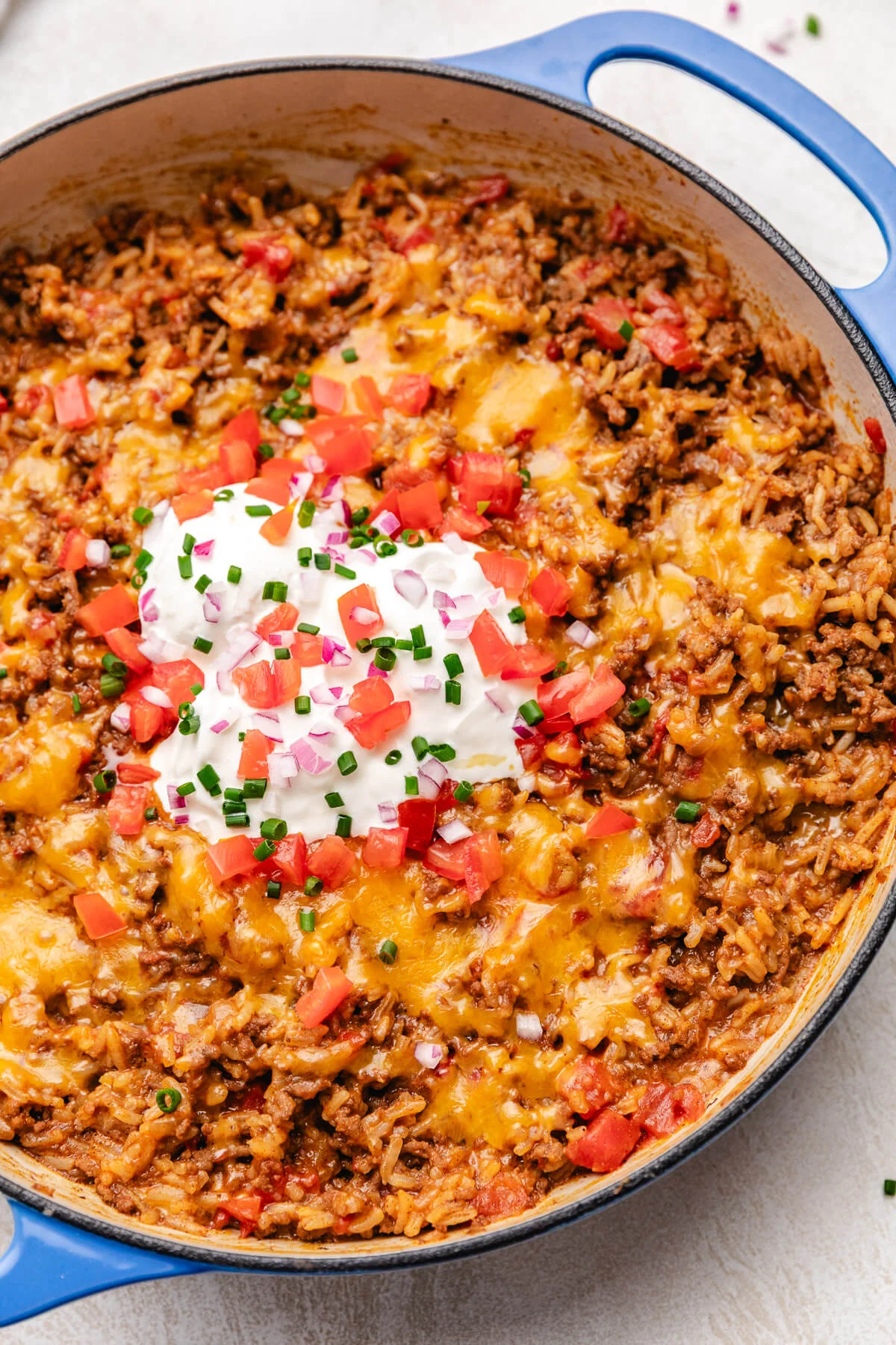 One Pot Taco Rice Pan filled with cheesy taco rice.