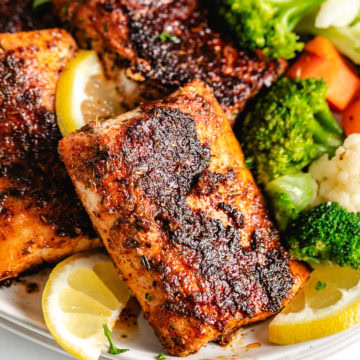 Blackened mahi mahi with blanched vegetables.