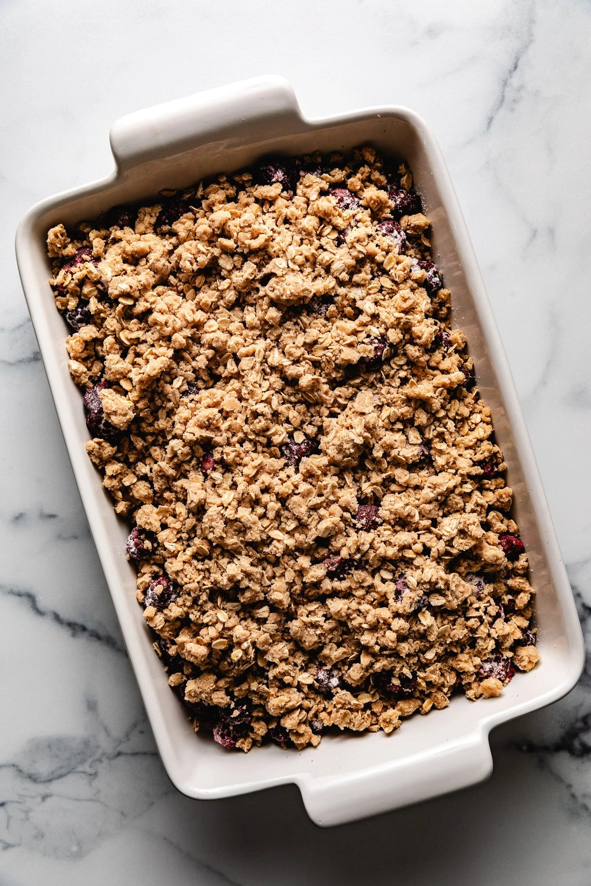 Blackberry Crisp Crumble topping on berry crisp.