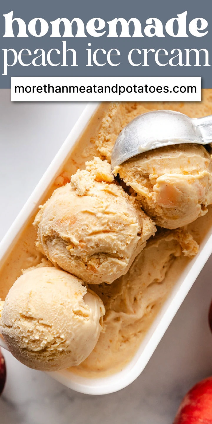 Close up view of peach ice cream in a container.