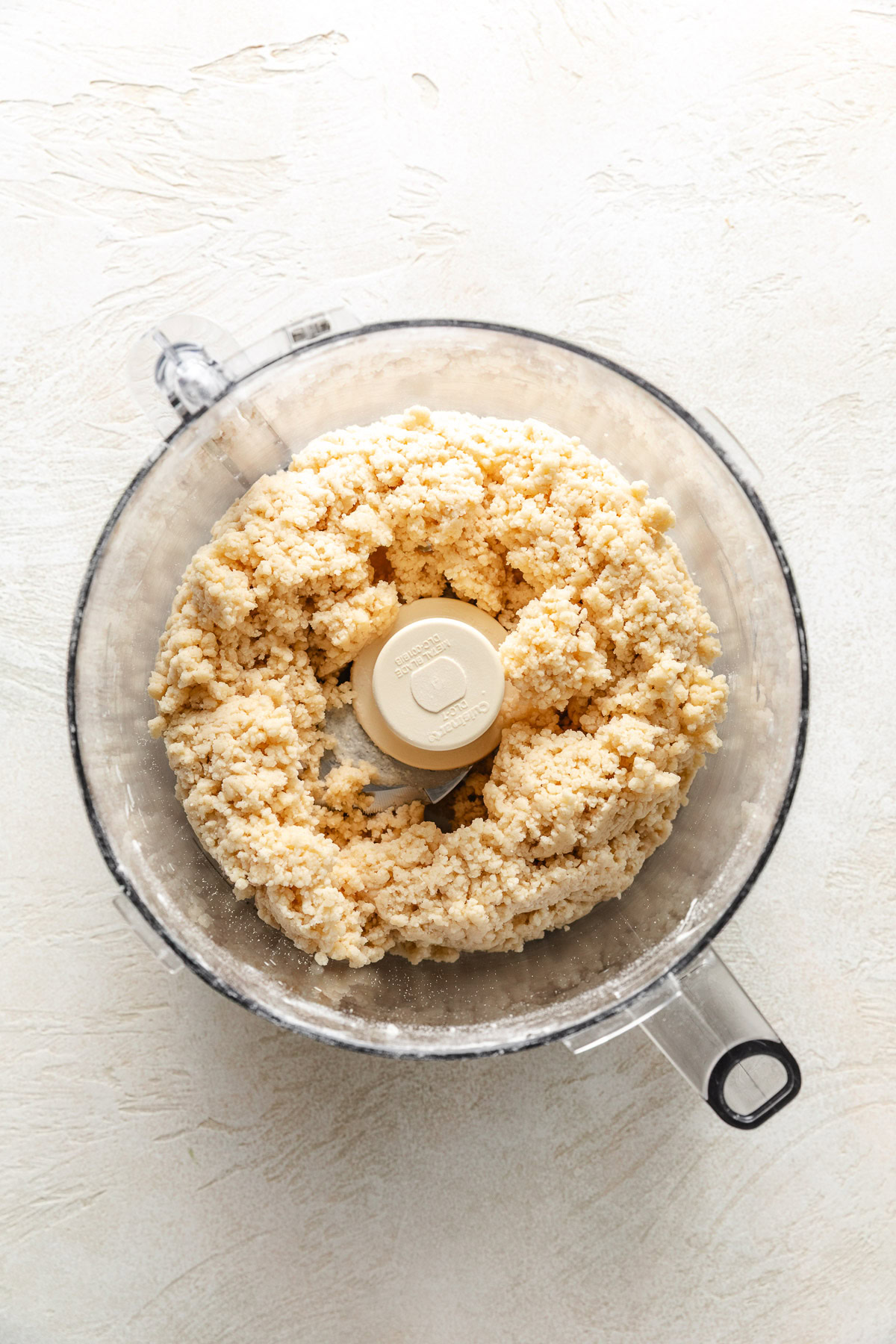 Biscuit dough in a food processor.