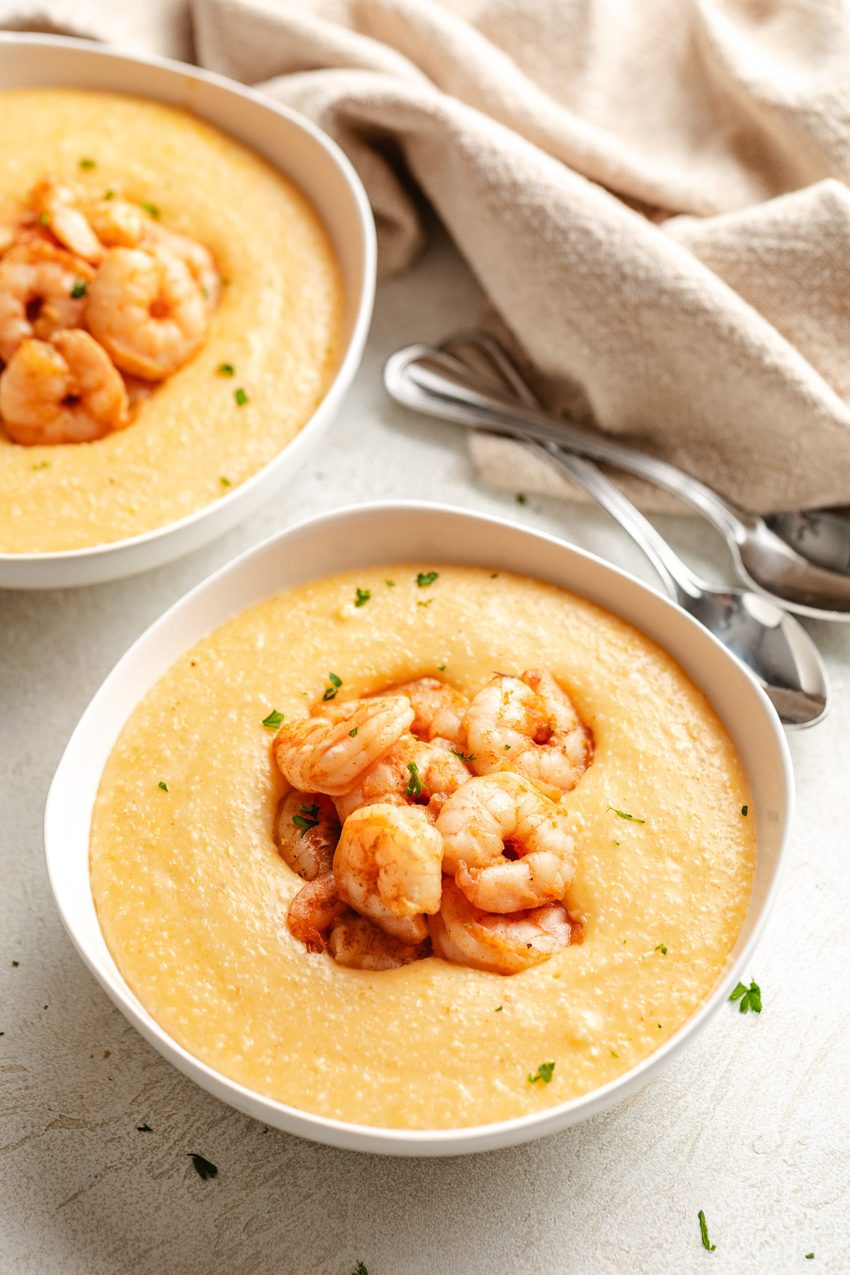 Cajun shrimp and grits in a bowl.