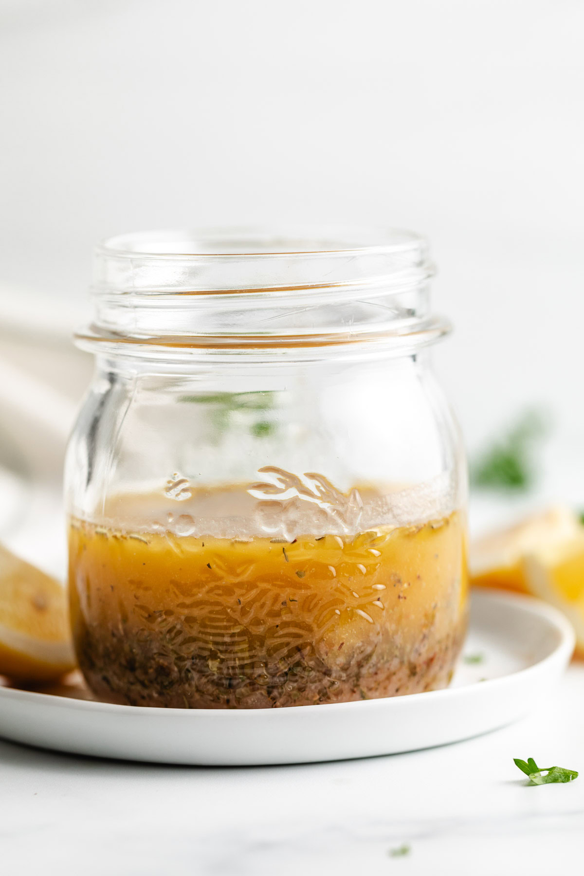 Side view of dressing in a jar.