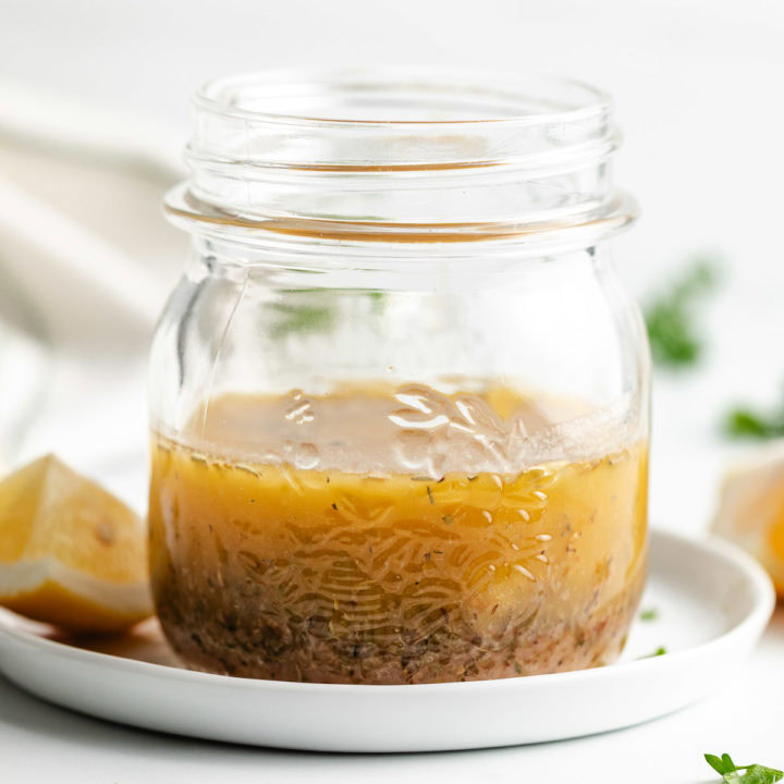 Close up view of italian dressing in a jar.