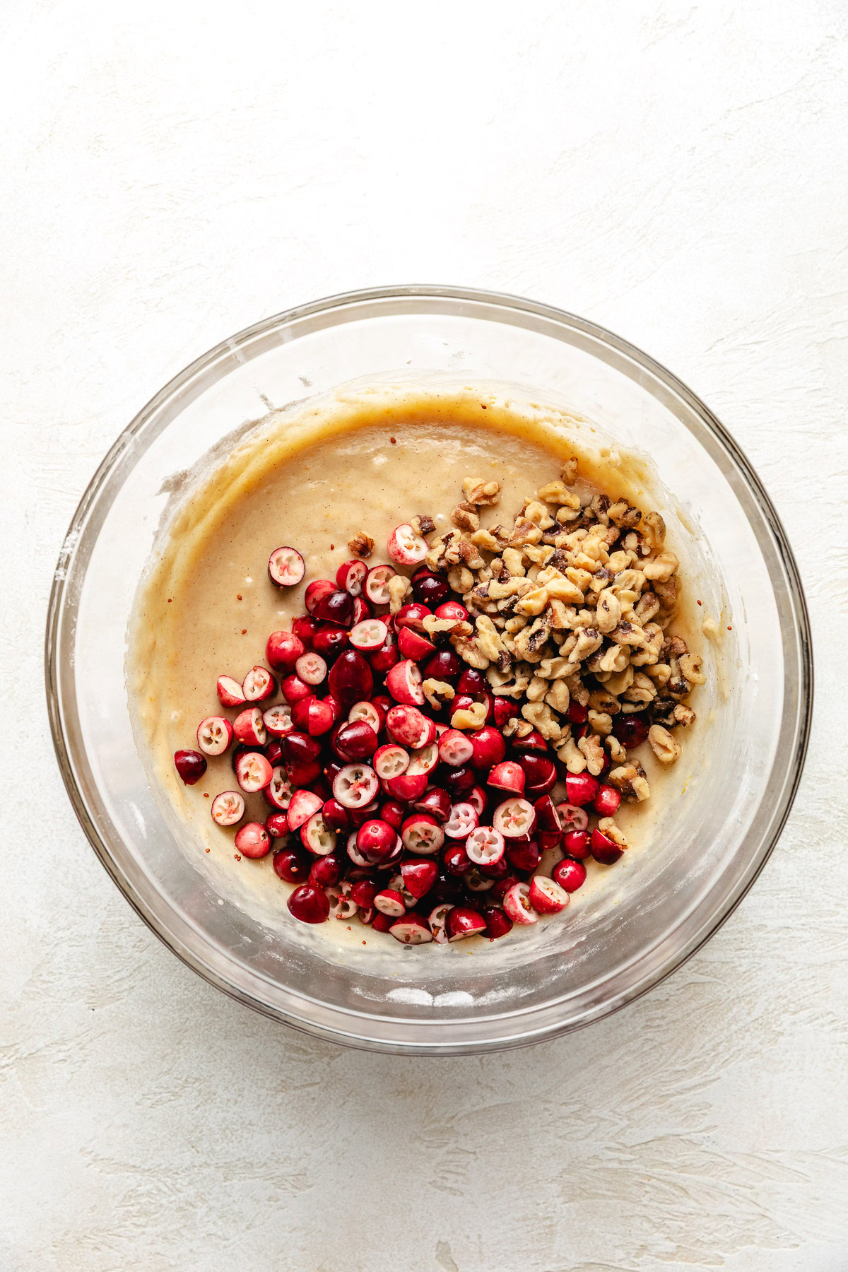 Cranberry Nut Bread Bowl of bread batter with cranberries and walnuts.