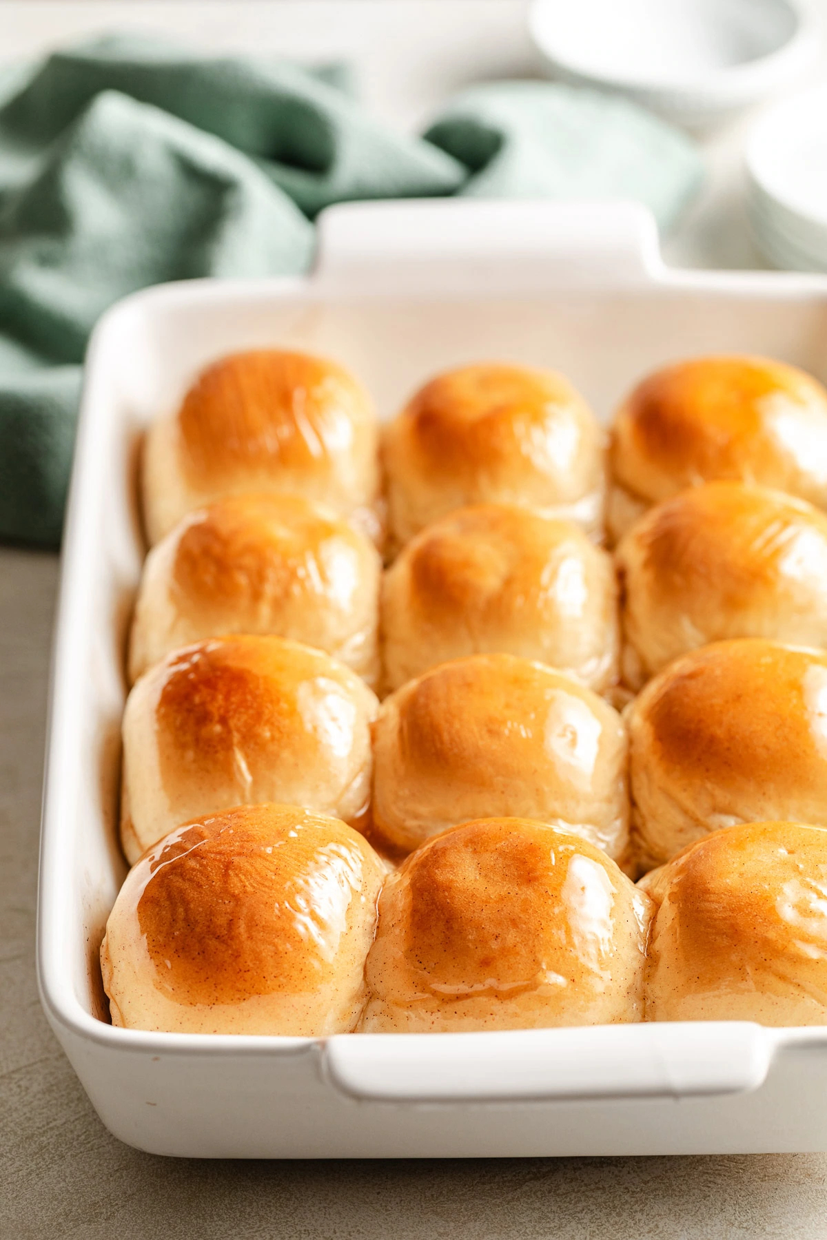 Pan filled with honey butter rolls.