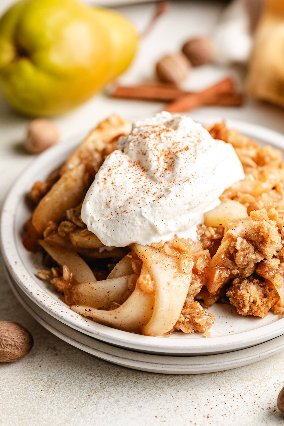 Scoops of pear crisp on a plate.