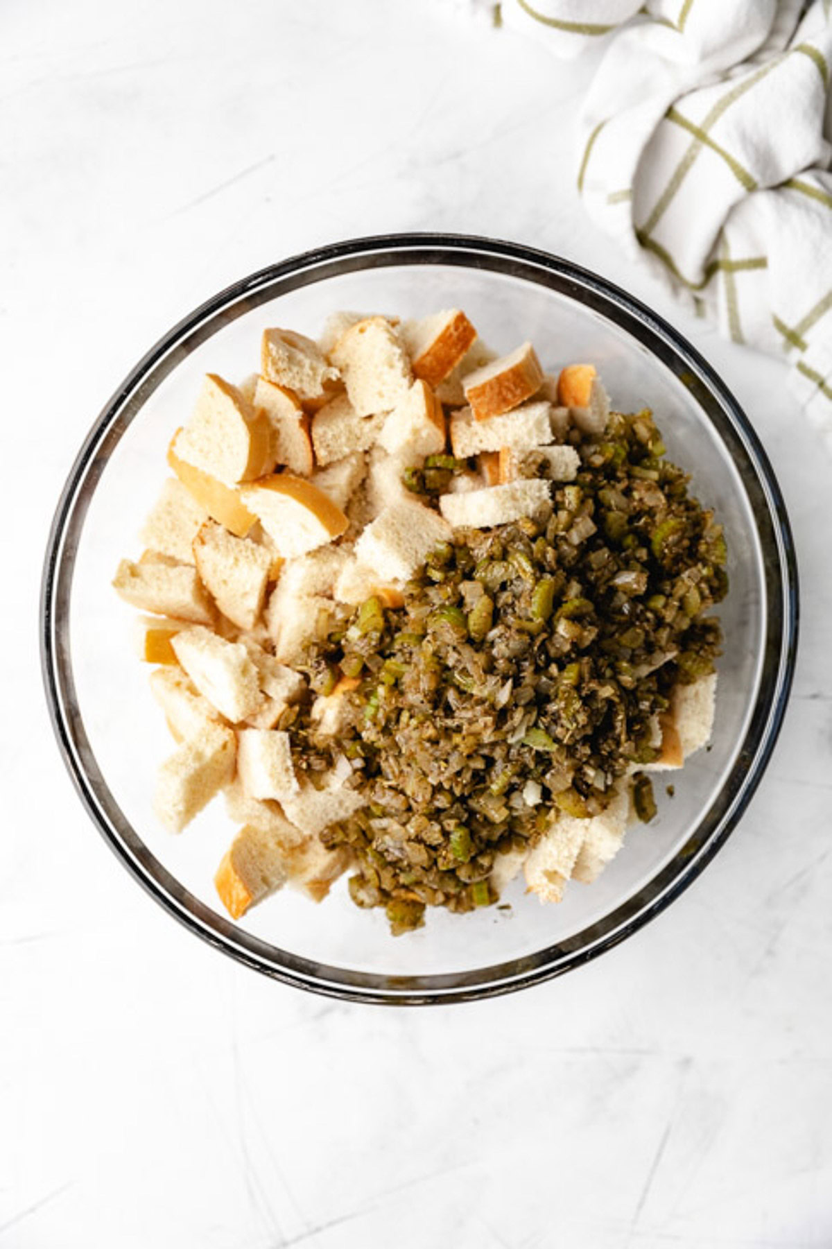 Seasoned vegetables added to dried bread.