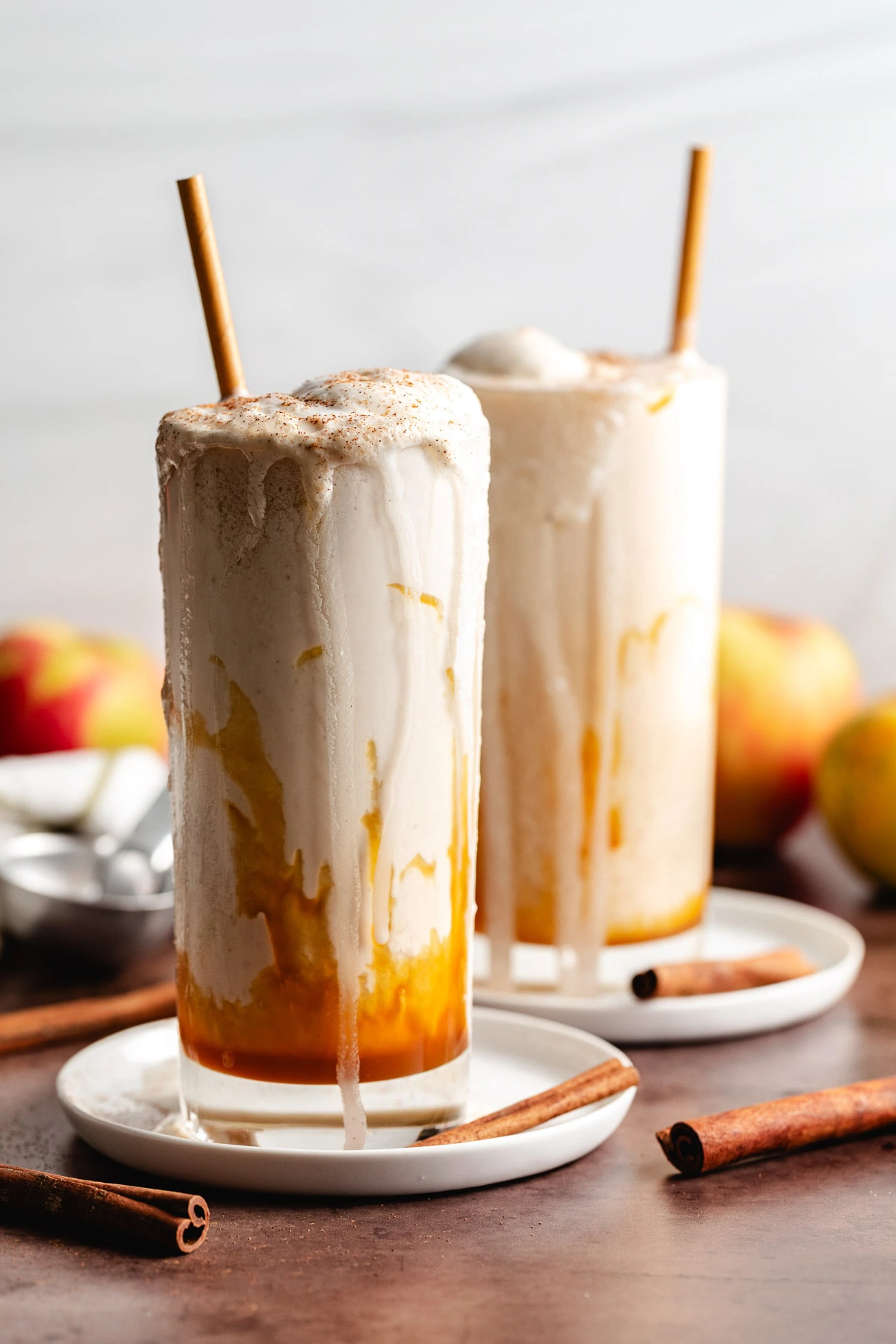 2 Ingredient Apple Cider Floats Two apple pie ice cream floats on plates.