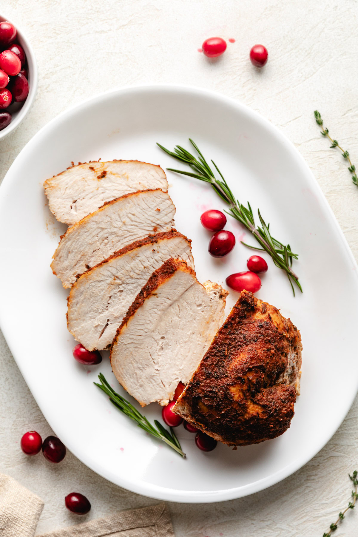 Sliced turkey breast on a platter.