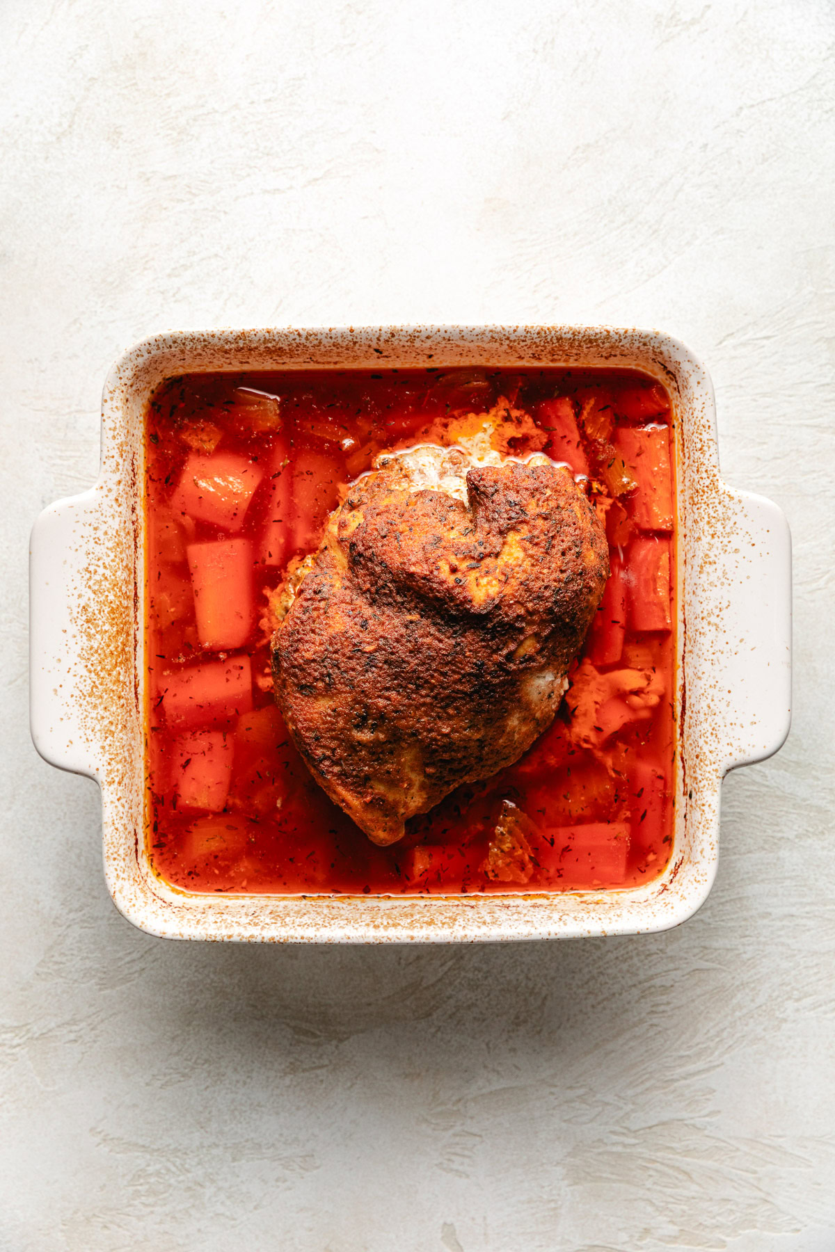 Roasted turkey in a pan.