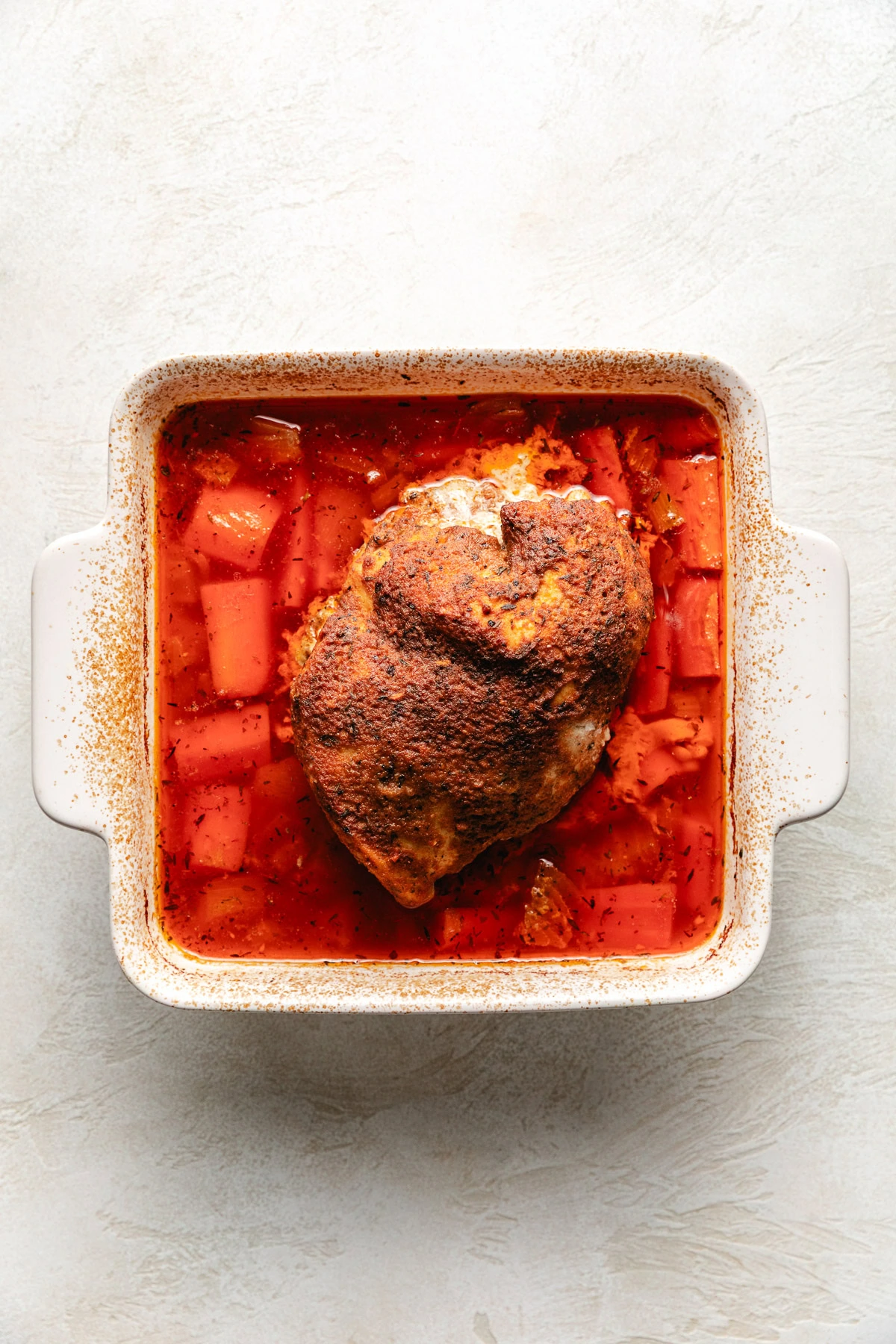 Roasted turkey in a pan.