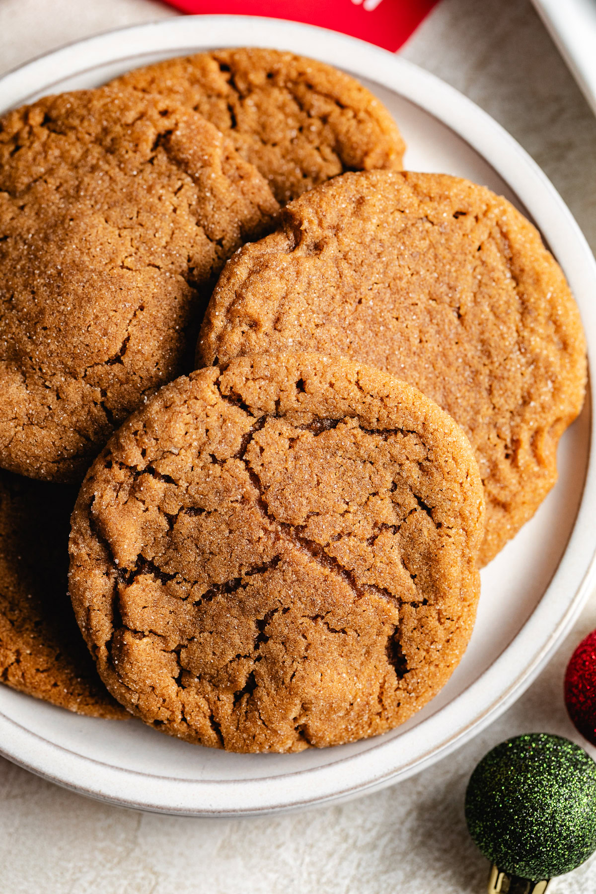 Soft And Chewy Ginger Cookies Plate of freshly baked ginger cookies.