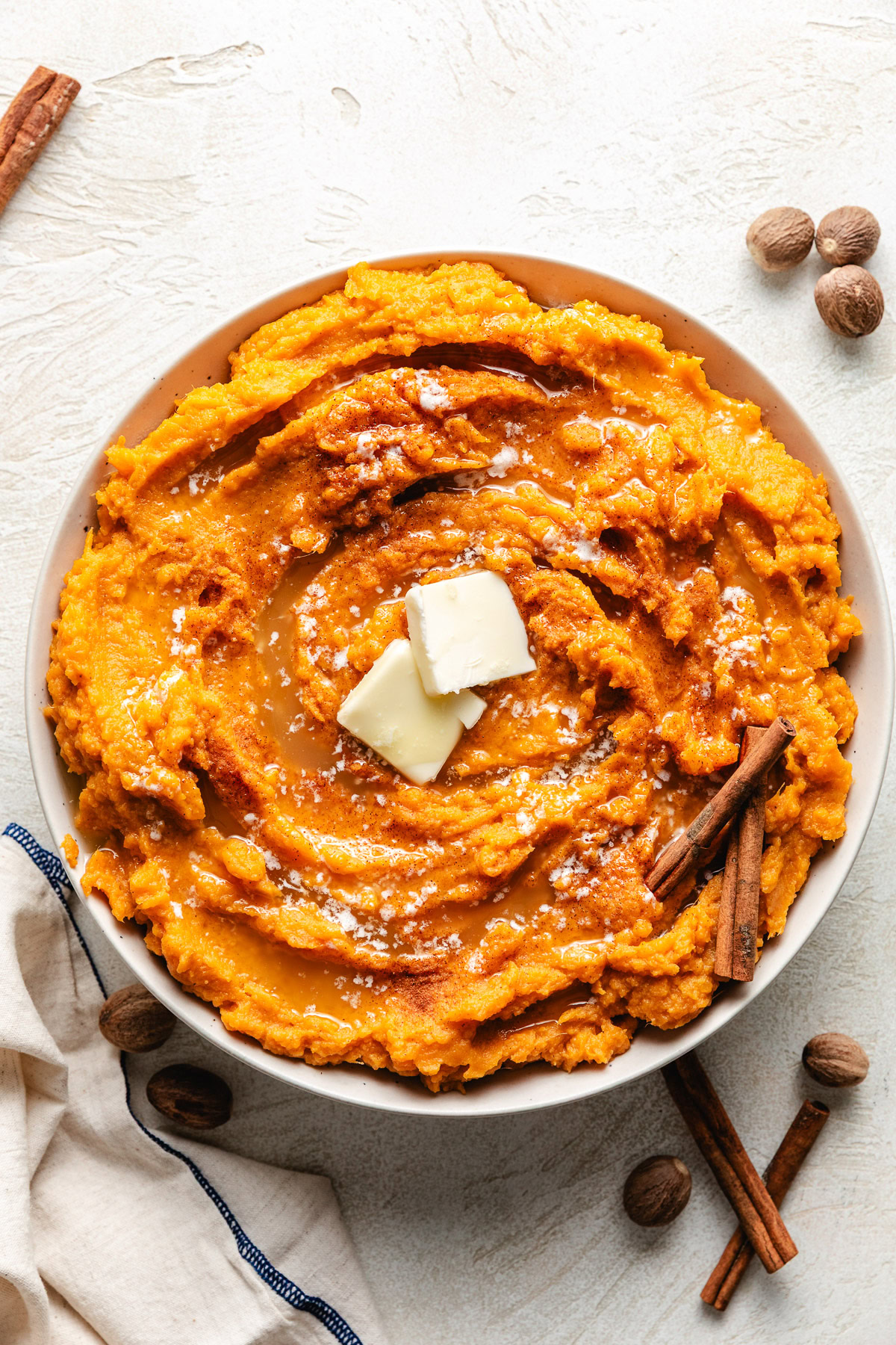 Overhead view of sweet mashed potatoes in a dish.