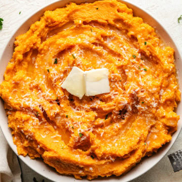 Close up view of savory mashed sweet potatoes.