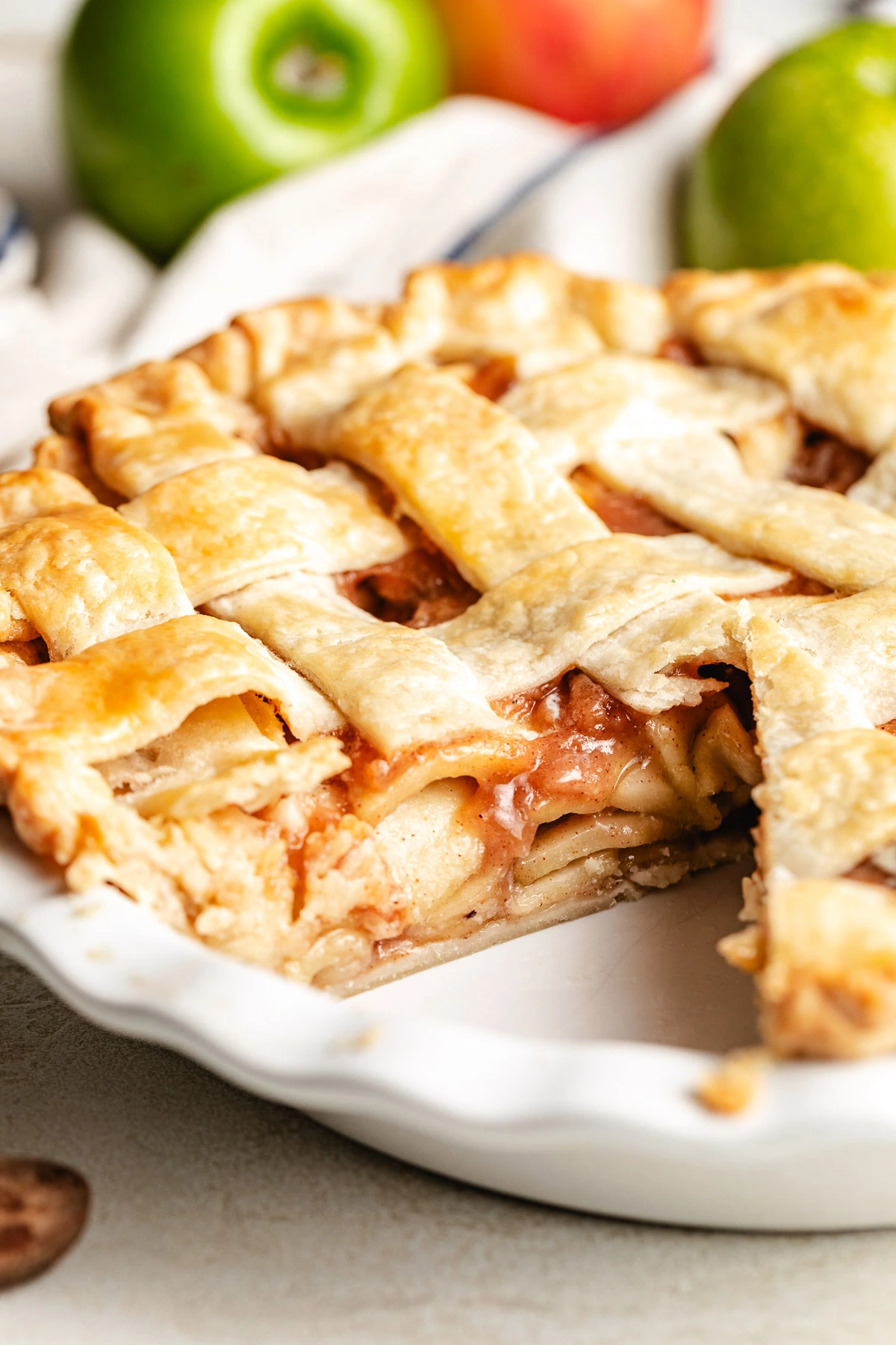 Southern Apple Pie Slice taken out of an apple pie.