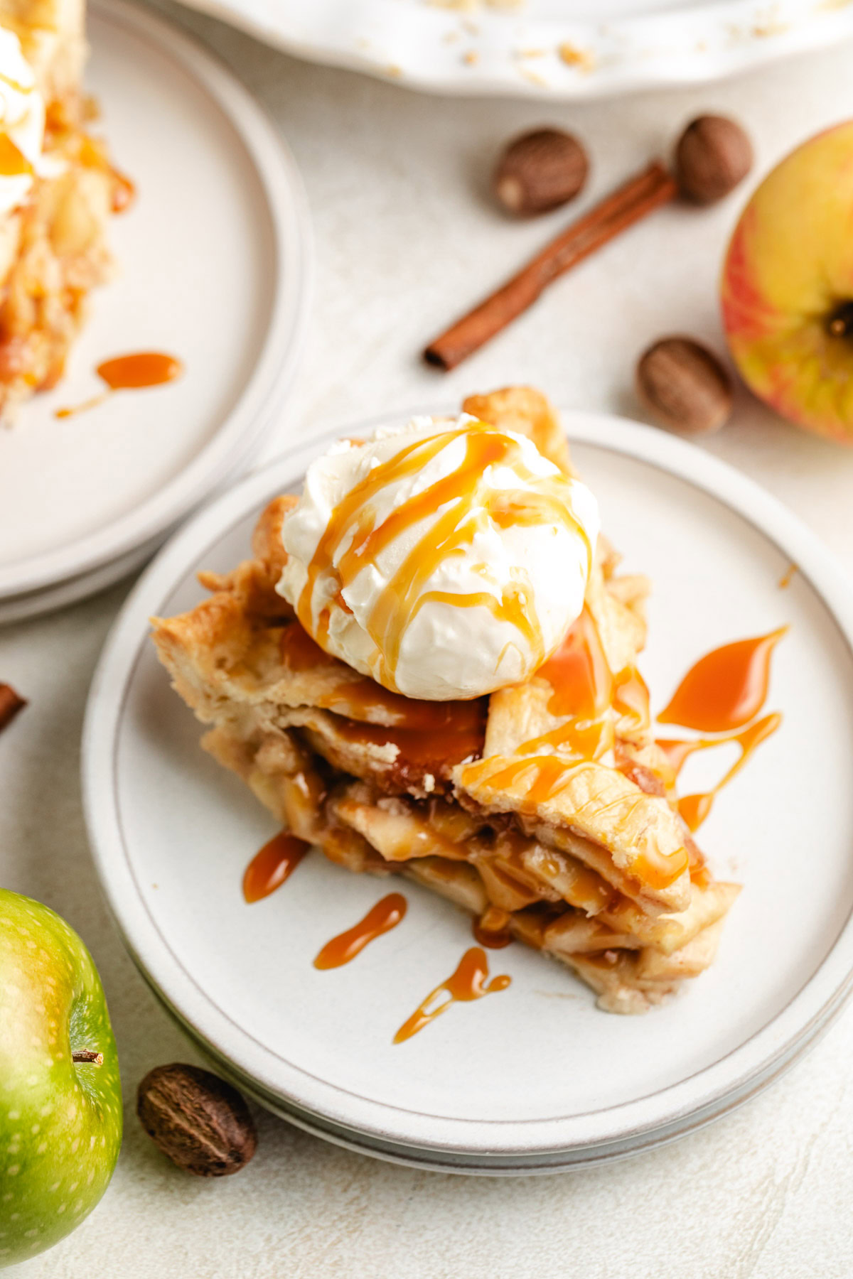 Vanilla ice cream on apple pie.
