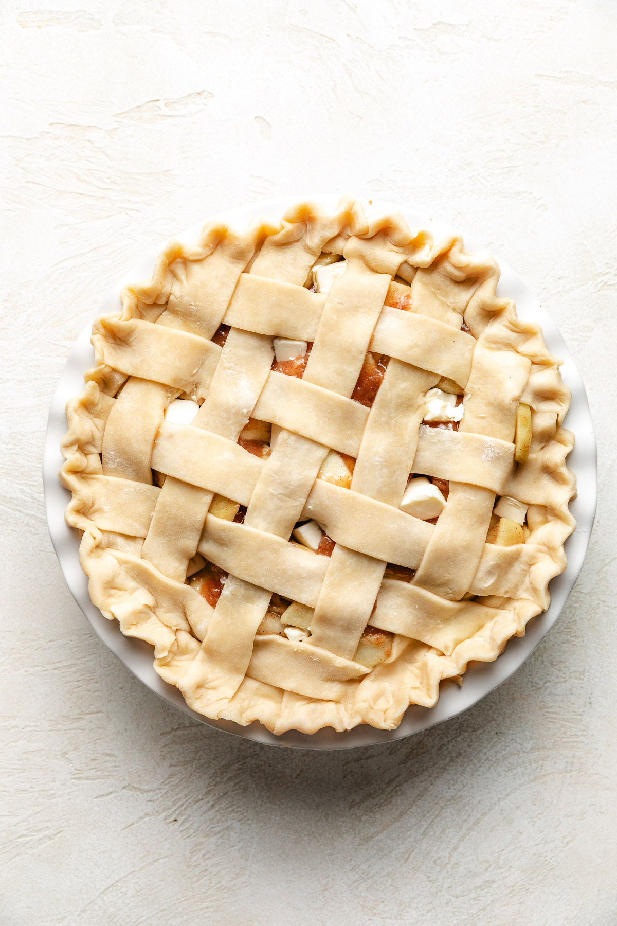 Southern Apple Pie Unbaked apple pie with lattice top.