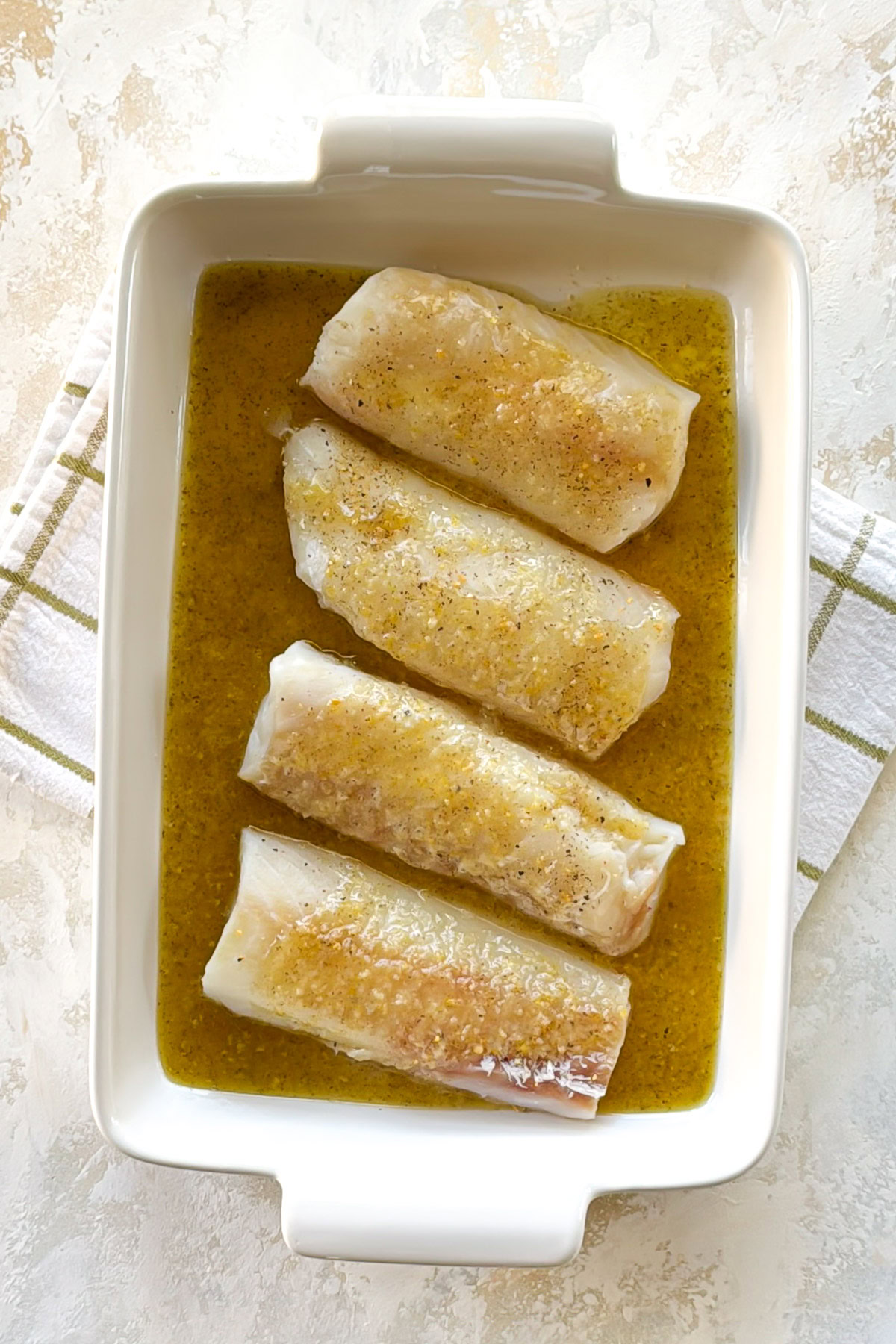 Lemon Garlic Butter Baked Cod Baked cod fillets in lemon sauce.