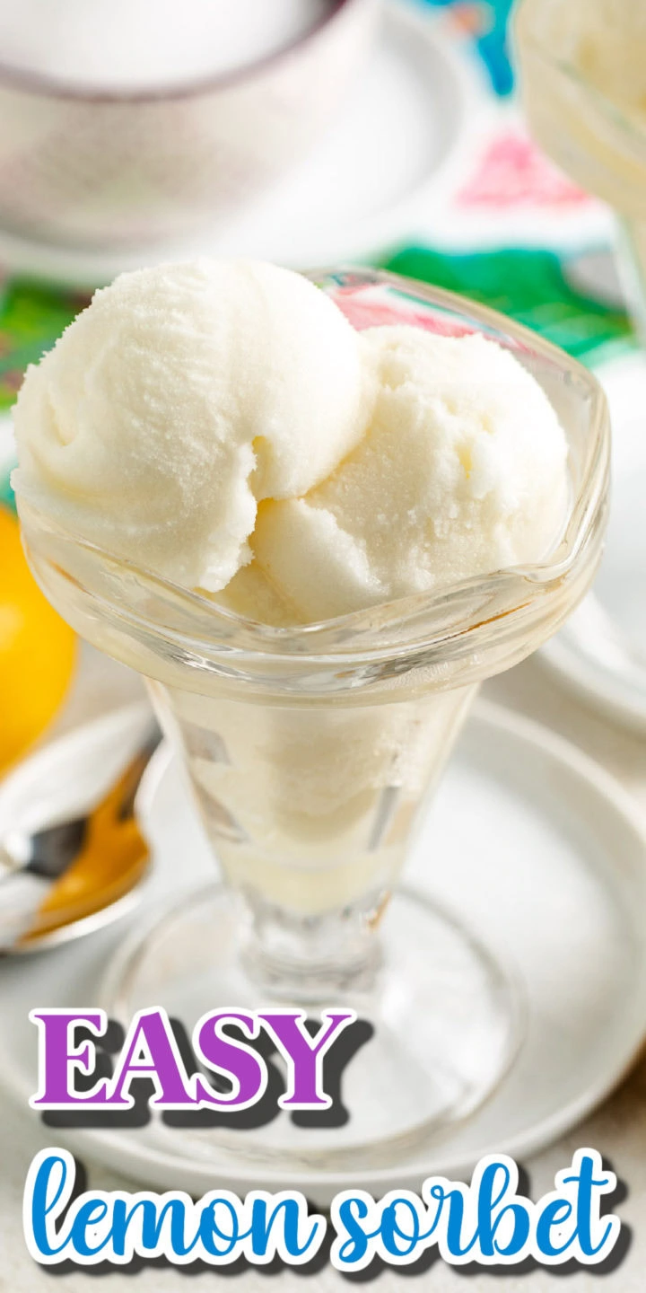 Easy lemon sorbet in a glass dessert cup with a spoon and lemons, plus a text overlay that says “EASY lemon sorbet.”